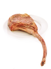Bone-in Raw seasoned rib eye steak
