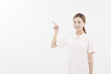 Fototapeta premium 白衣でポーズをとる女性