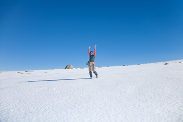hiker woman greeting in snow
