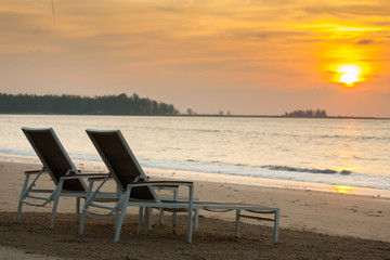  beach chairs before sunset