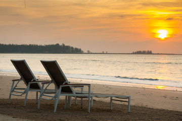  beach chairs before sunset