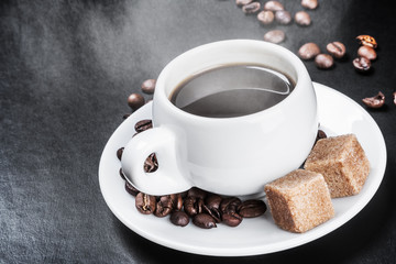 Hot coffee cup on a black background