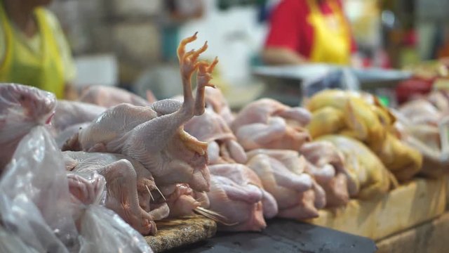 Raw Fresh Poultry selling stall in Malaysia, Asian Fresh market, wet market selling raw chicken meat