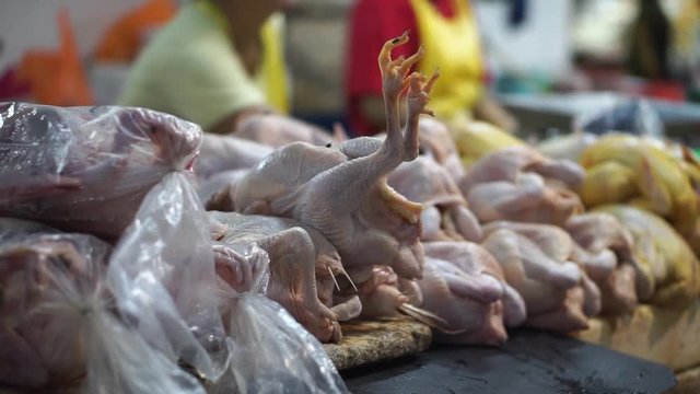 Raw Fresh Poultry selling stall in Malaysia, Asian Fresh market, wet market selling raw chicken meat