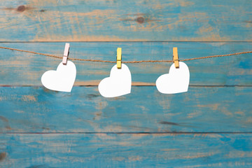 Love hearts on wooden texture background, valentines day card concept