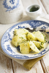 Potatoes with fresh dill and oil
