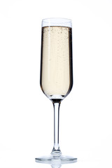 champagne flute full of alcoholic beverage.
