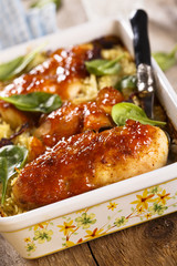 Baked chicken with rice and mango glaze
