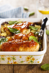 Baked chicken with rice and mango glaze
