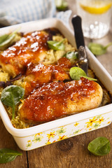 Baked chicken with rice and mango glaze
