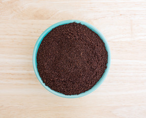 Kona coffee ground beans in a bowl