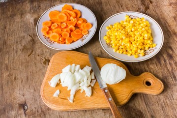 Sliced Onions, carrots and corn 