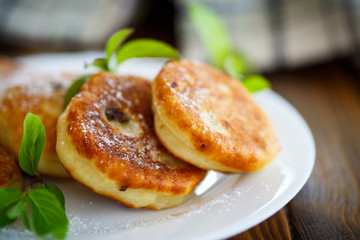 sweet cheese pancakes on a plate 