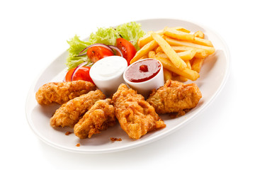 Fried chicken nuggets and vegetables 
