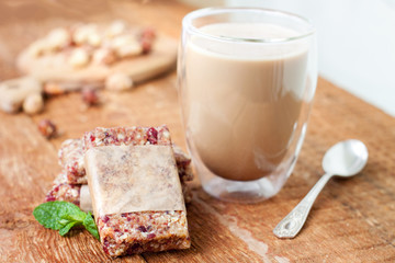 Granola bars and a glass of coffee