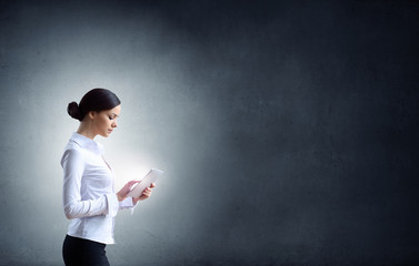 Elegant woman using tablet pc