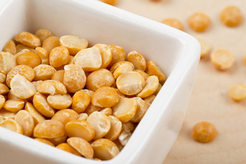 cropped image of a bowl with yellow lentils.