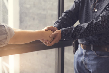 businessman handshaking for business acquisiton concept