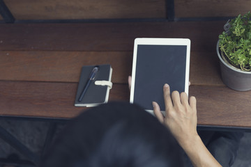 man's hand using digital tablet