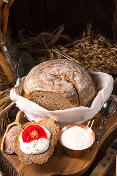 homemade bread with cream and tomato