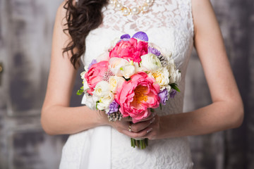 Obraz na płótnie Canvas beautiful colorful wedding bouquet for the bride. Wedding accessories.