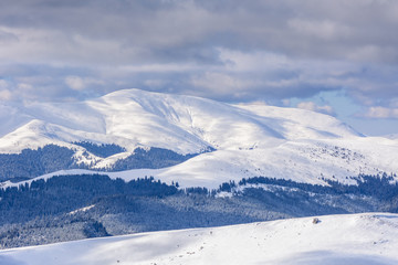 Winter landscape over Carpathian Mountains. Panorama of snow mou