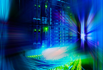 Network switch and UTP ethernet cables close-up in the server ro
