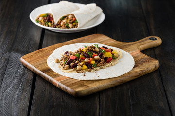 Vegan wraps with lentil, chickpea peppers and kidney bean