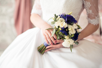 Obraz na płótnie Canvas beautiful colorful wedding bouquet for the bride. Wedding accessories.