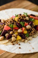 Vegan wraps with lentil, chickpea peppers and kidney bean