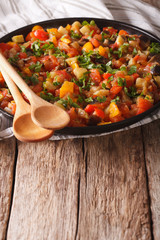Pistou: eggplant, peppers, tomatoes, zucchini, onion close-up. vertical
