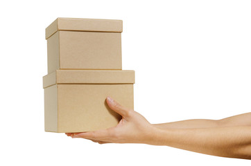 hand holding cardboard box isolated on a White background