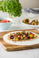 Vegan wraps with lentil, chickpea peppers and kidney bean