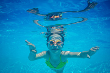 Underwater portrait of child