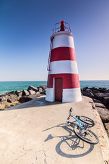 Lighthouse and bike in Portimao