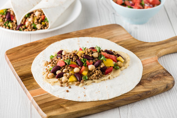 Vegan wraps with lentil, chickpea peppers and kidney bean