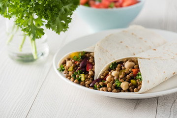 Vegan wraps with lentil, chickpea peppers and kidney bean