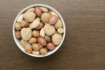 a bowl with mixed nuts