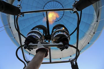 Acrylic prints Air sports Hand adhere to the gas burner of  air balloon