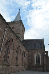 Fototapeta na wymiar Tower and stone walls of saint John's Kirk church in the city of Perth, Scotland