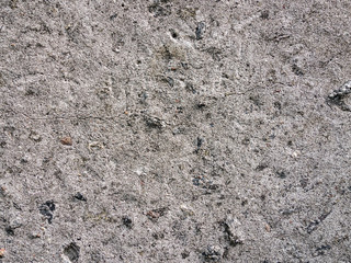 Wall of small stone and concrete