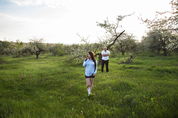 couple waiting baby  stands on a distance