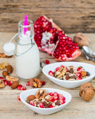 Granola with nuts, raisins and pomegranate. Healthy Breakfast
