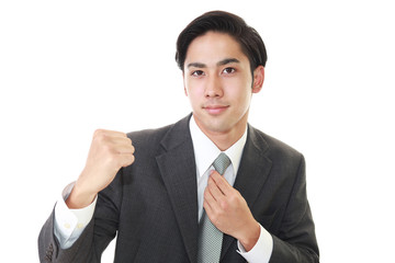 ガッツポーズのビジネスマン