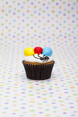 close-up shot of cupcake with balloon shape.
