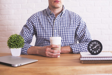 Guy with coffee in hands