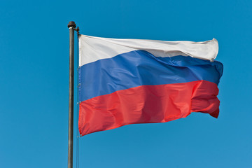 Fototapeta na wymiar The flag of Russia in the sky