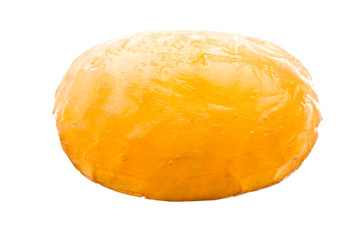 macro shot of a yellow candy.