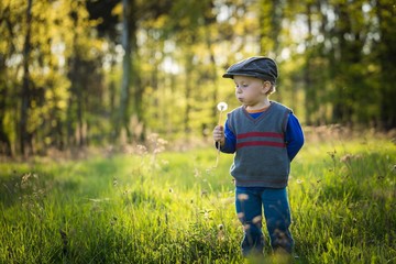 Happy caucasian boy playing outdoor