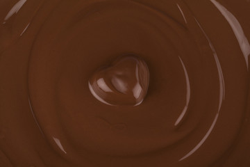 Fototapeta na wymiar melted chocolate with heart shape